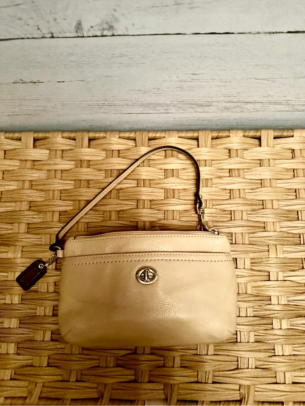 Coach Beige Leather wristlet with Turn-Lock Closure